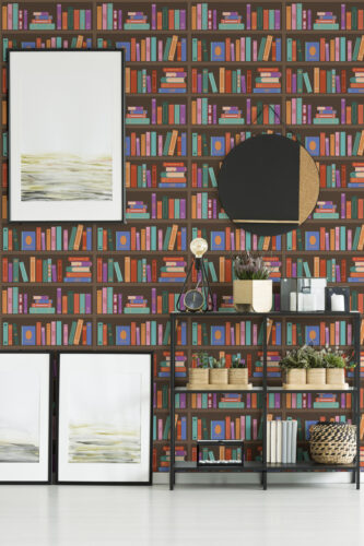 Bold Brown Bookshelf peel and stick wallpaper with colorful illustrated book spines arranged in neat rows on dark wood shelves.