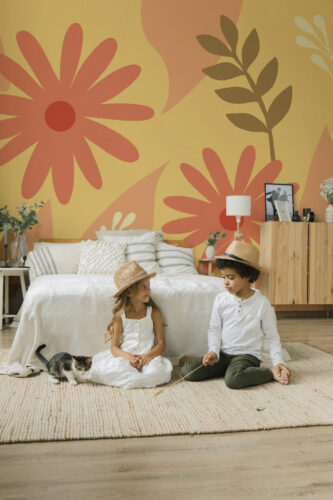 Retro Daisy Florals pre-pasted wall mural spans the wall behind the bed, featuring oversized daisies in warm orange and yellow tones.