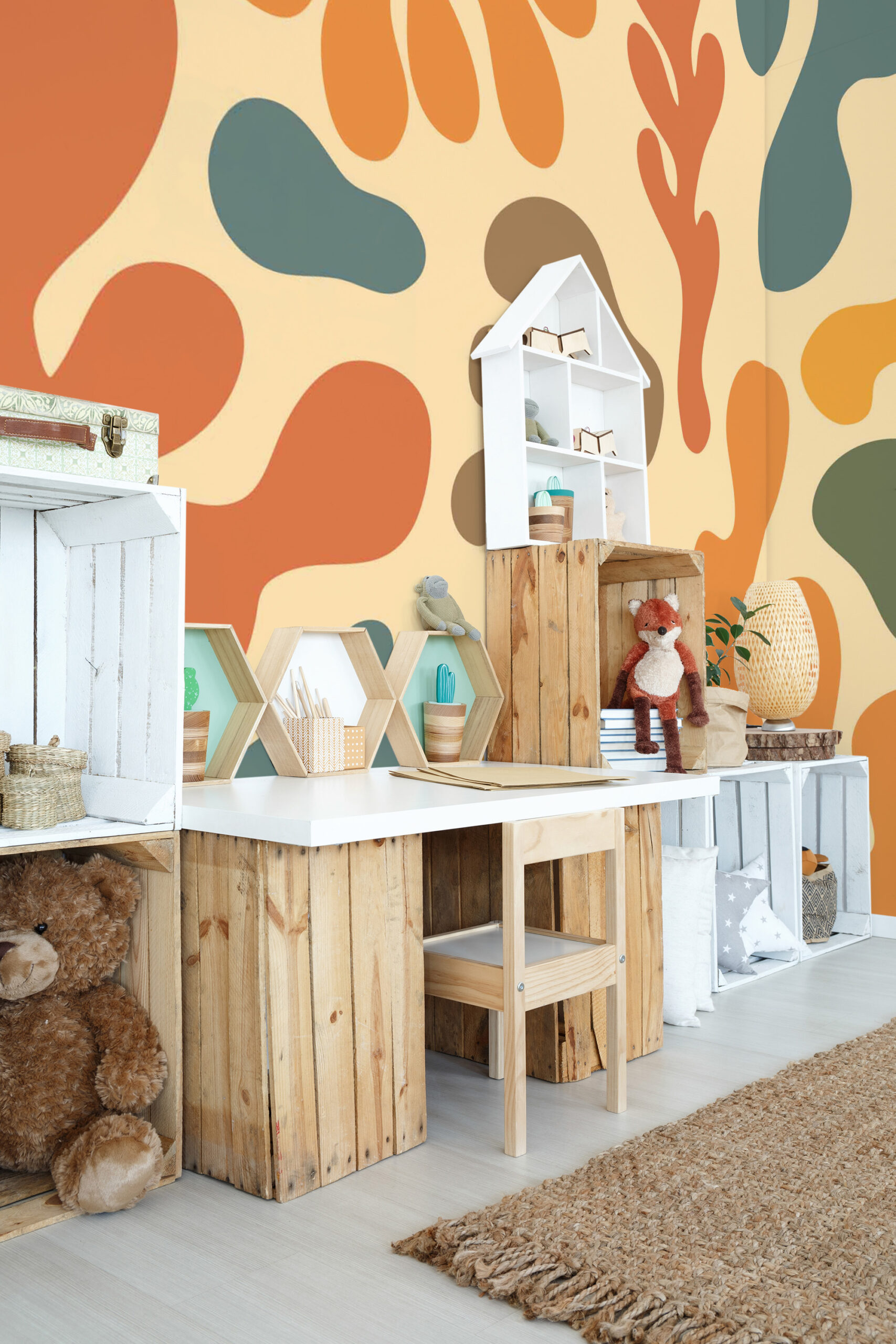 Retro Abstract Color Splash non-pasted wall mural with bold orange and teal shapes spanning a full wall behind a kids desk and shelves.