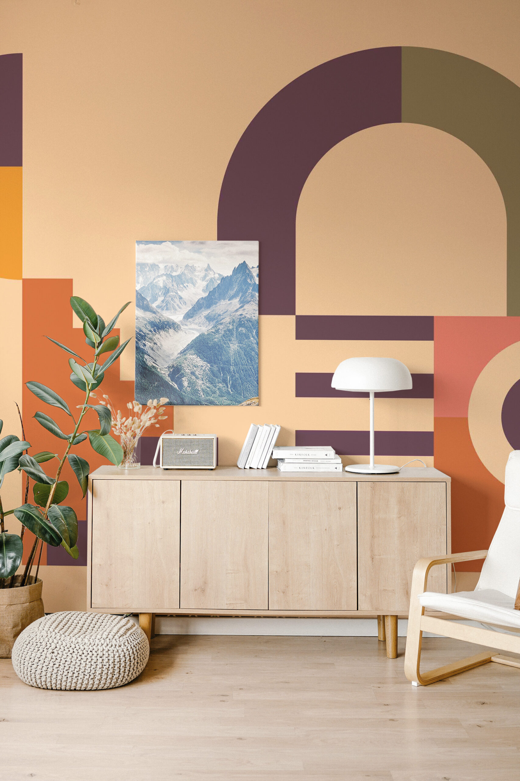Retro Geometric Playroom features a wall mural of bold arches and blocks in peach, plum, olive, and orange.