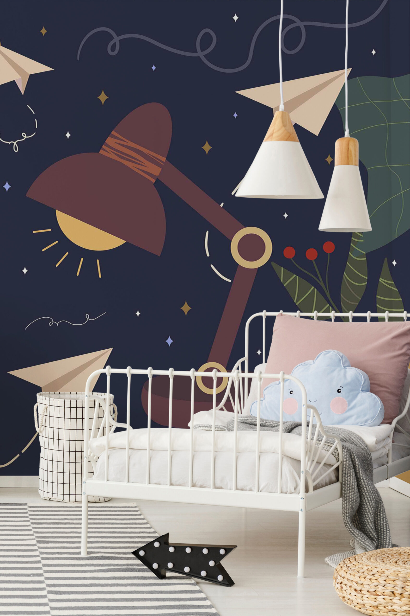 Whimsical Study Desk shows a wall mural with an oversized desk lamp, paper planes, and stars behind a child’s bed.