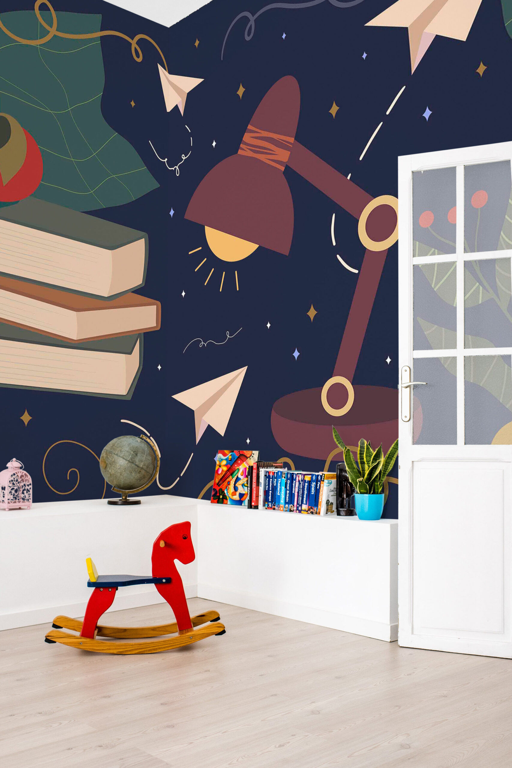 Whimsical Study Desk self-adhesive wall mural with a desk lamp, stacked books, and paper planes on a dark starry accent wall.