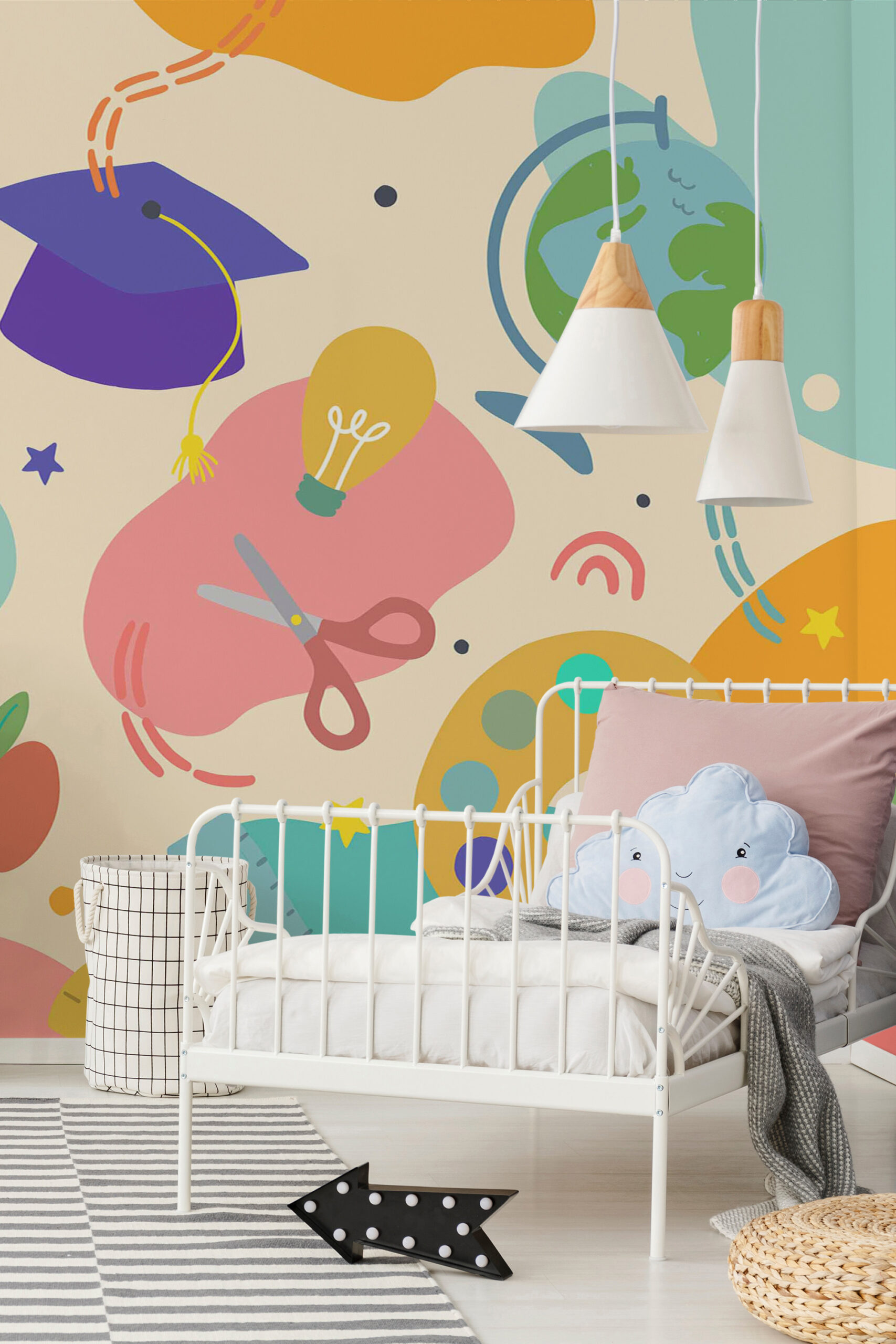 Playful School Supplies self-adhesive wall mural covering a nursery wall with bright school icons behind a white metal crib.