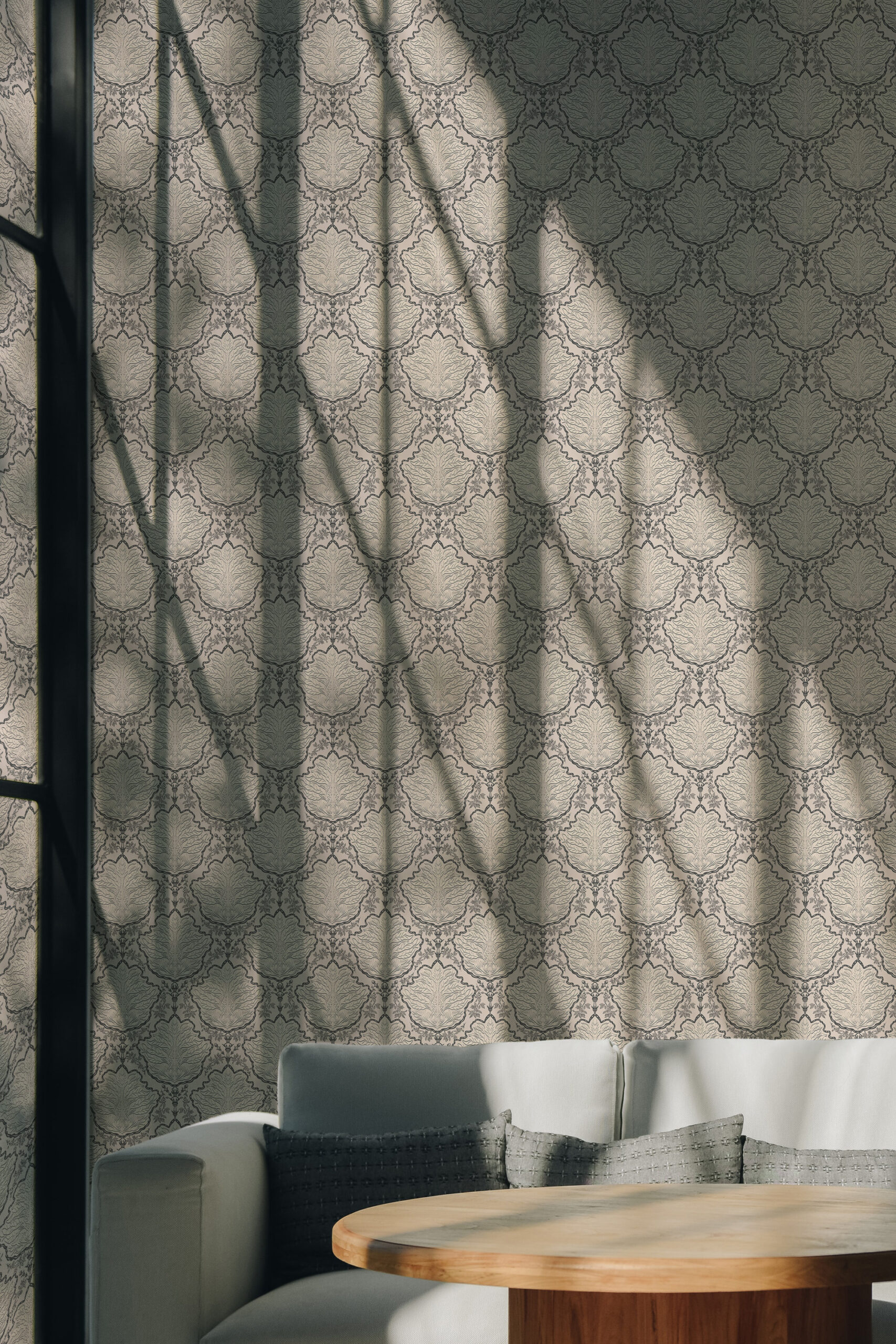 Vintage Beige Leaf Damask non-pasted wallpaper with repeating leaf damask shapes across a living room accent wall behind a sofa.