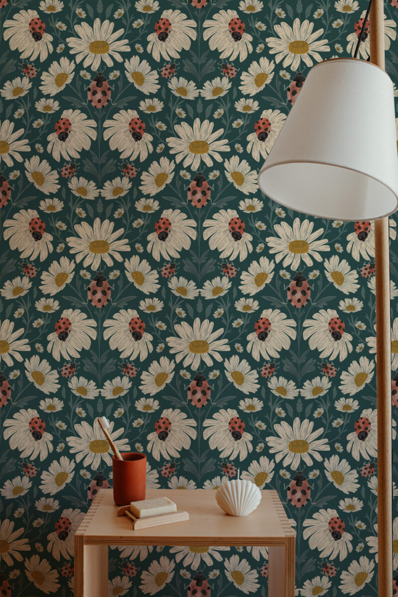 Whimsical Teal Ladybug Floral peel and stick wallpaper with cream daisies and red ladybugs on a teal background.