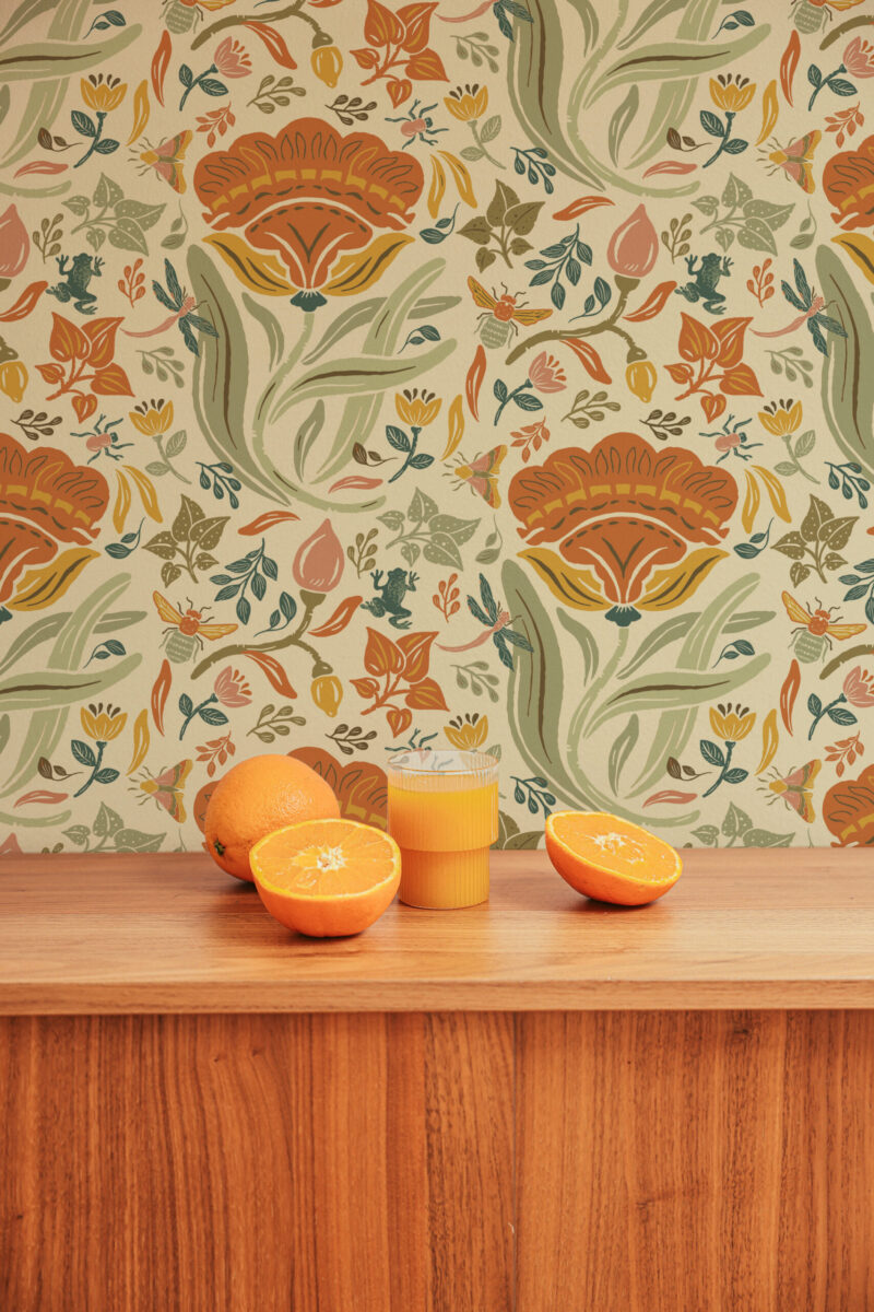 Bold Beige Floral peel and stick wallpaper with oversized orange flowers, green leaves, and small insects on a tan ground.