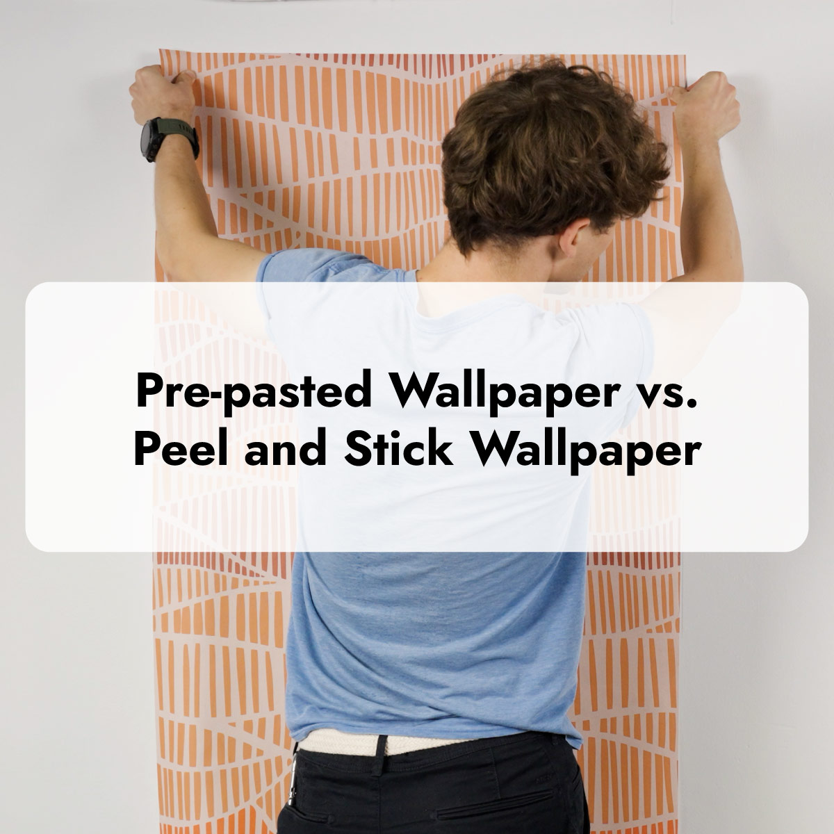Man holding wallpaper panel