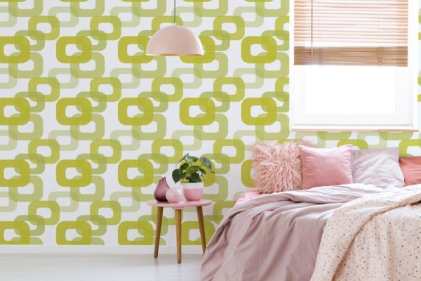 Green 70s wallpaper in bedroom