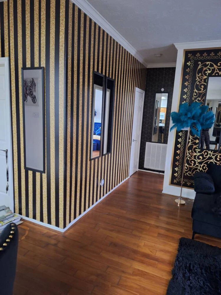 Glitter striped peel and stick wallpaper installed in foyer - review picture submitted by Jurgis