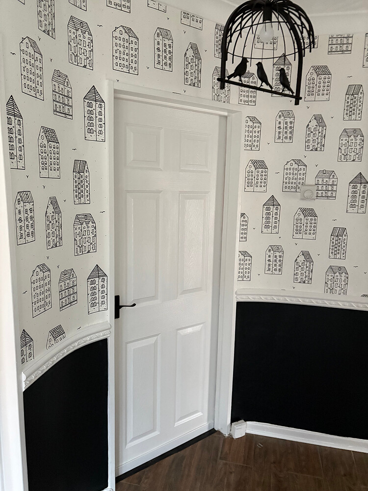 Houses peel and stick wallpaper installed in foyer - review picture submitted by Jurgis