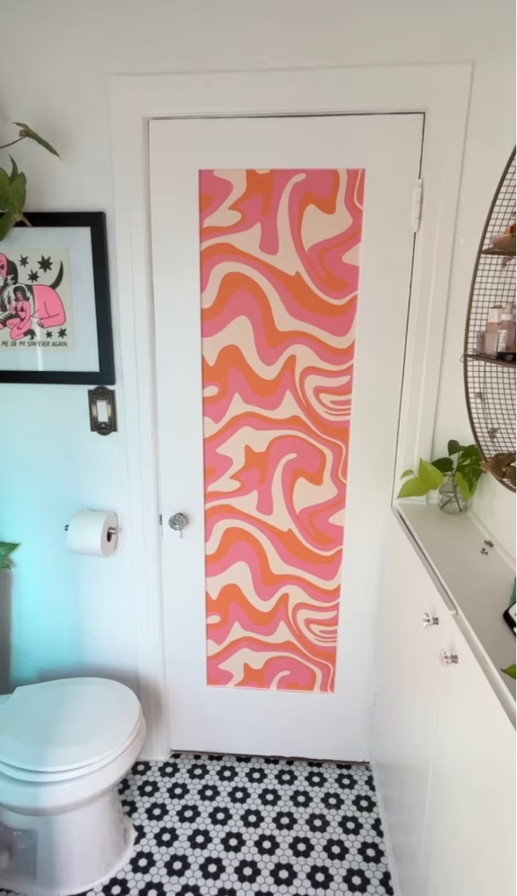 Orange groovy peel and stick wallpaper installed in bathroom - review picture submitted by Jurgis