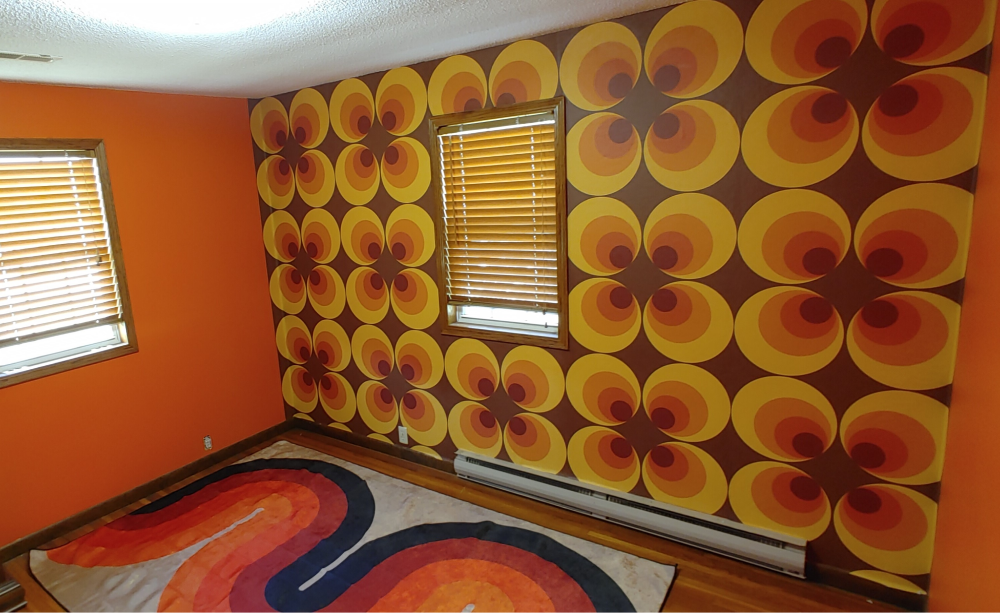 Retro 70s circle peel and stick wallpaper installed in living room - review picture submitted by Jurgis