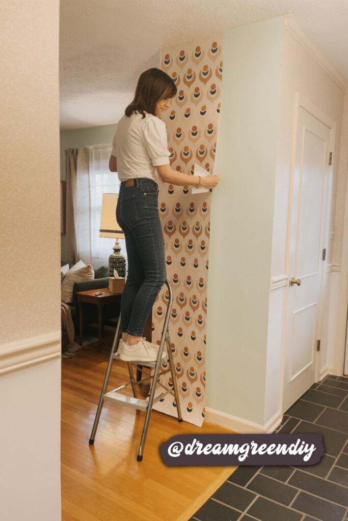 Colorful retro-inspired wallpaper design adding character to a small wall in a cozy interior space