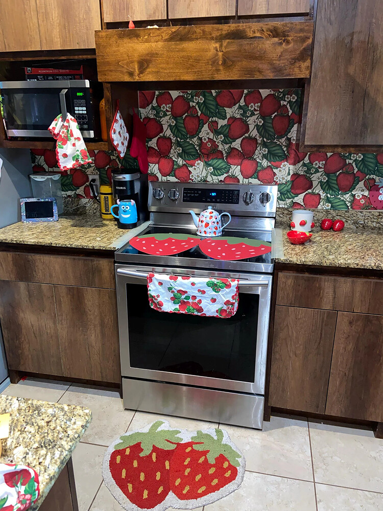 Strawberry Forest Red peel and stick wallpaper installed in kitchen- review picture submitted by Jurgis