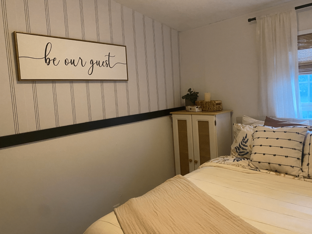 Stripe peel and stick wallpaper installed in bedroom - review picture submitted by Jurgis