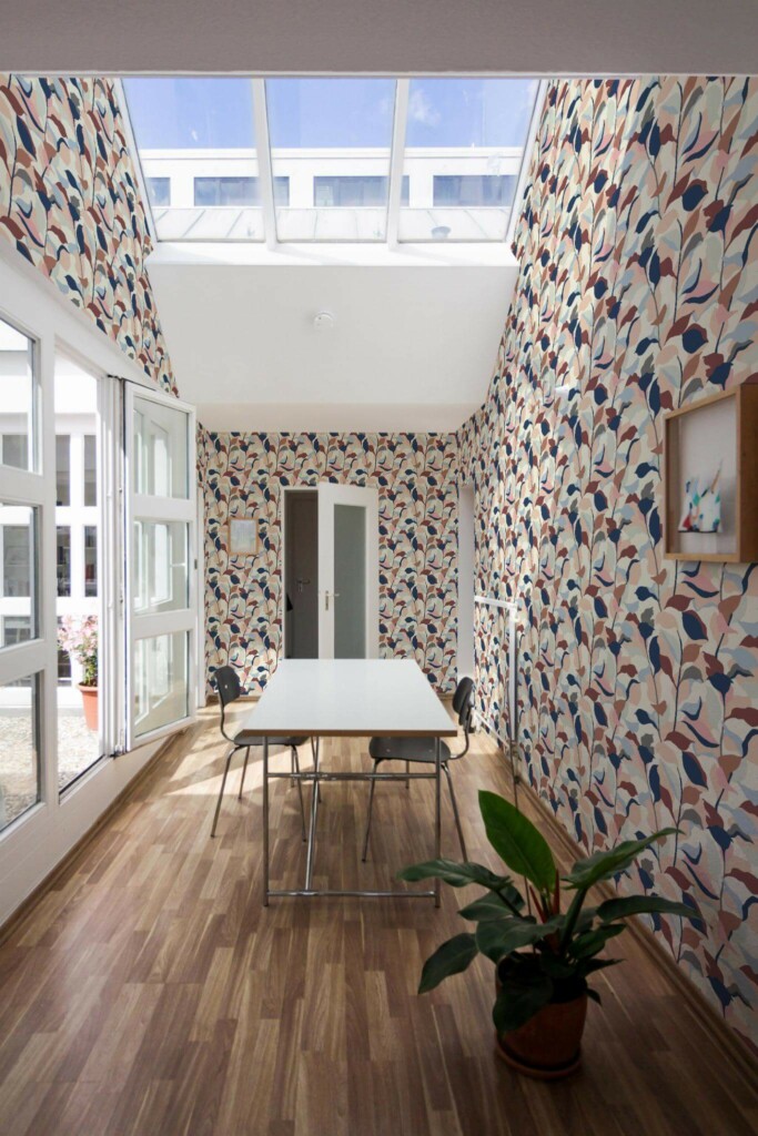 Minimal style dining room next to a balcony decorated with Abstract leaf peel and stick wallpaper