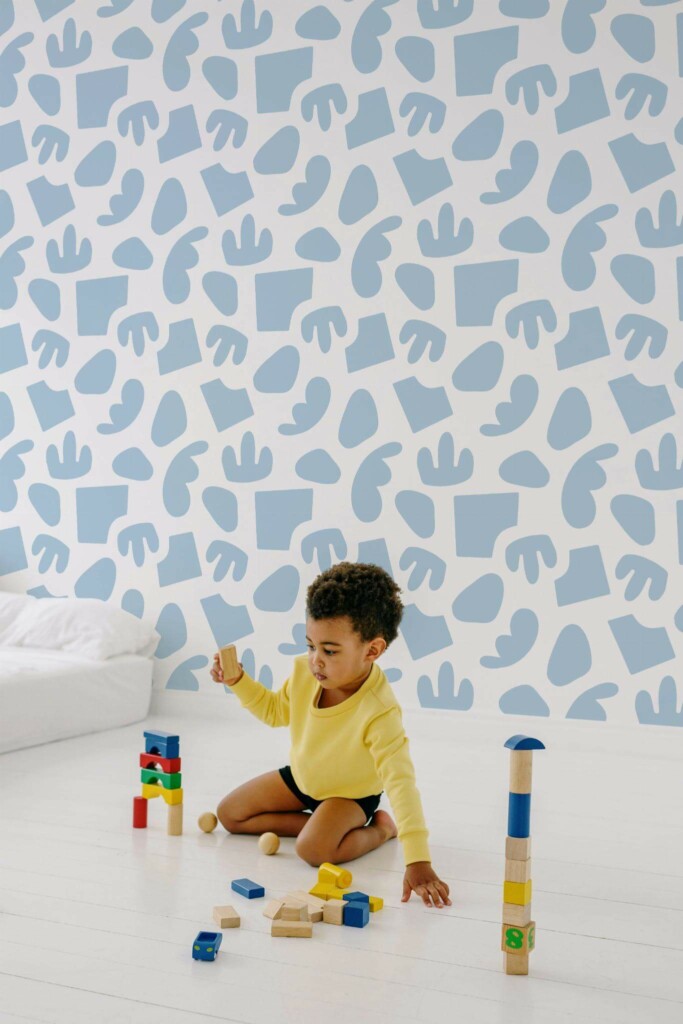 Minimal scandinavian style kids room decorated with Abstract shapes peel and stick wallpaper