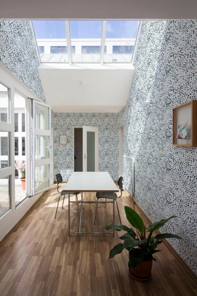 Minimal style dining room next to a balcony decorated with Abstract watercolor peel and stick wallpaper