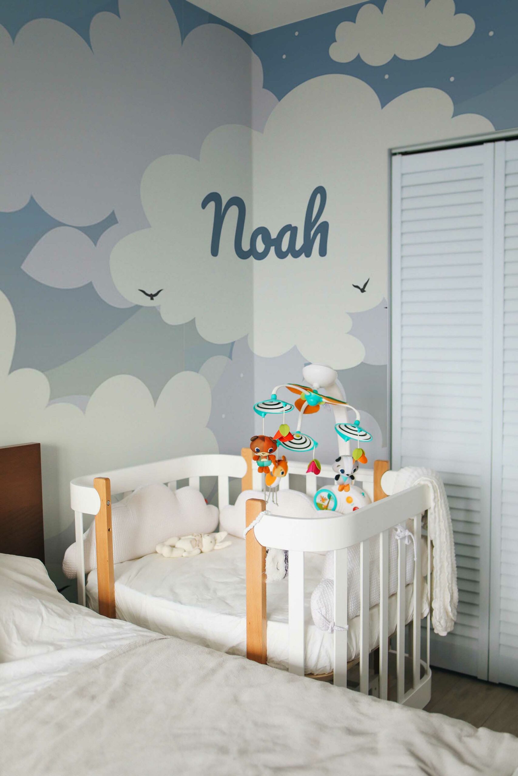 Cloudy Background Baby Name Here wall mural peel and stick by Fancy Walls