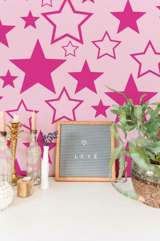 Peel and stick wallpaper showcasing Barbie's pink aesthetic