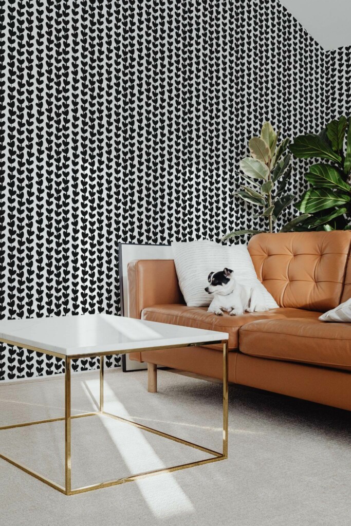 Mid-century modern style living room with dog on a sofa decorated with Black and white heart peel and stick wallpaper