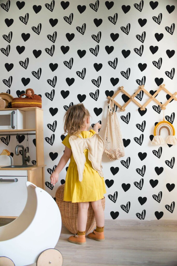 Bohemian style kids room decorated with Black and white hearts peel and stick wallpaper