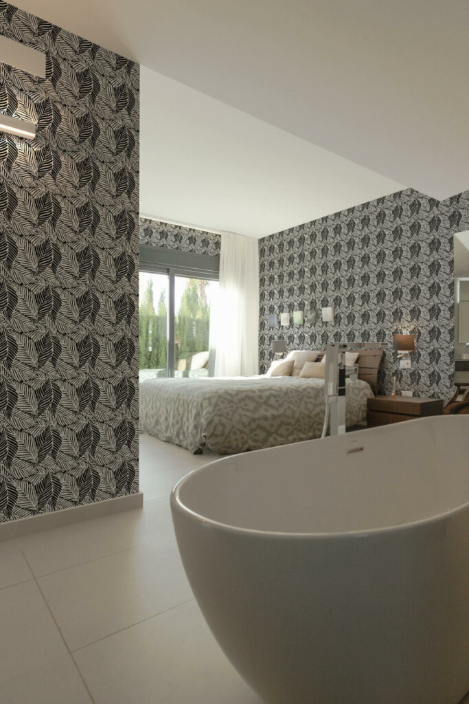Modern style bedroom with open bathroom decorated with Black and white leaf peel and stick wallpaper