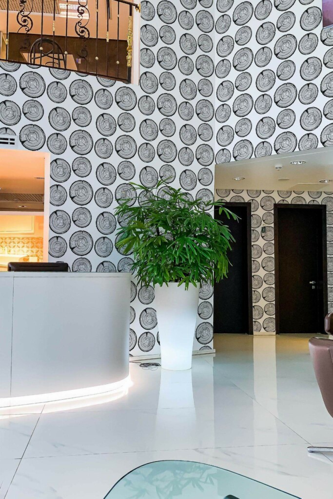 Modern style hallway in a hotel decorated with Black and white tree trunk peel and stick wallpaper