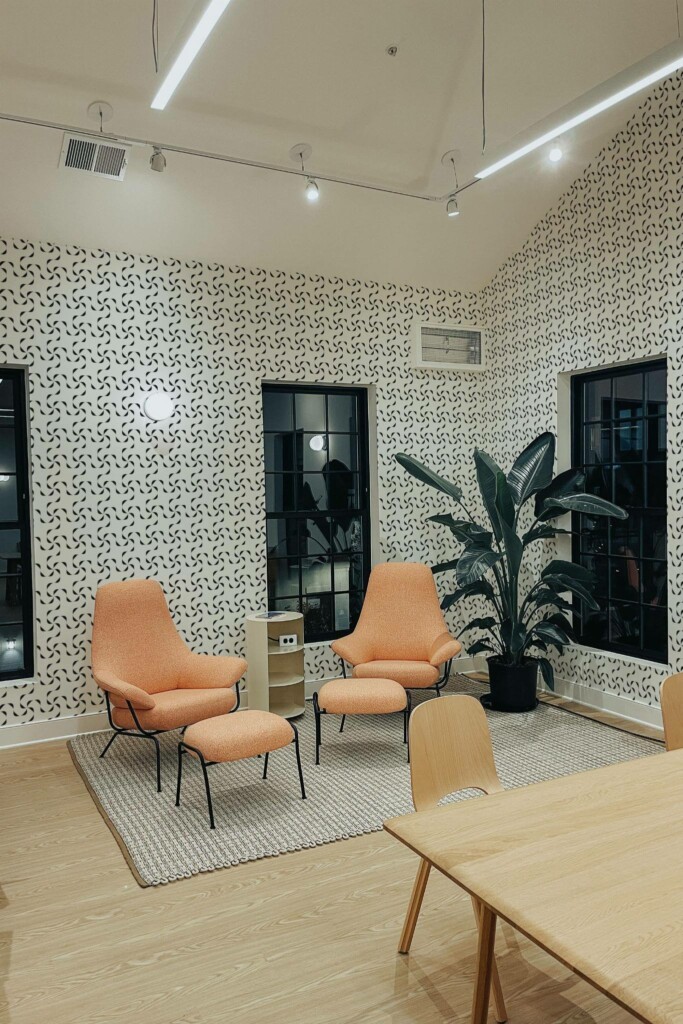 Minimal style living room decorated with Black and white twirl peel and stick wallpaper and mid-century style chairs