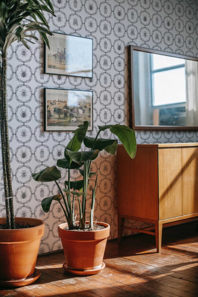 Fancy Walls removable wallpaper showing black and white insect cameos for a gothic interior