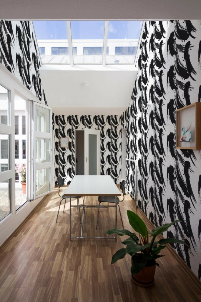 Minimal style dining room next to a balcony decorated with Black brush strokes peel and stick wallpaper