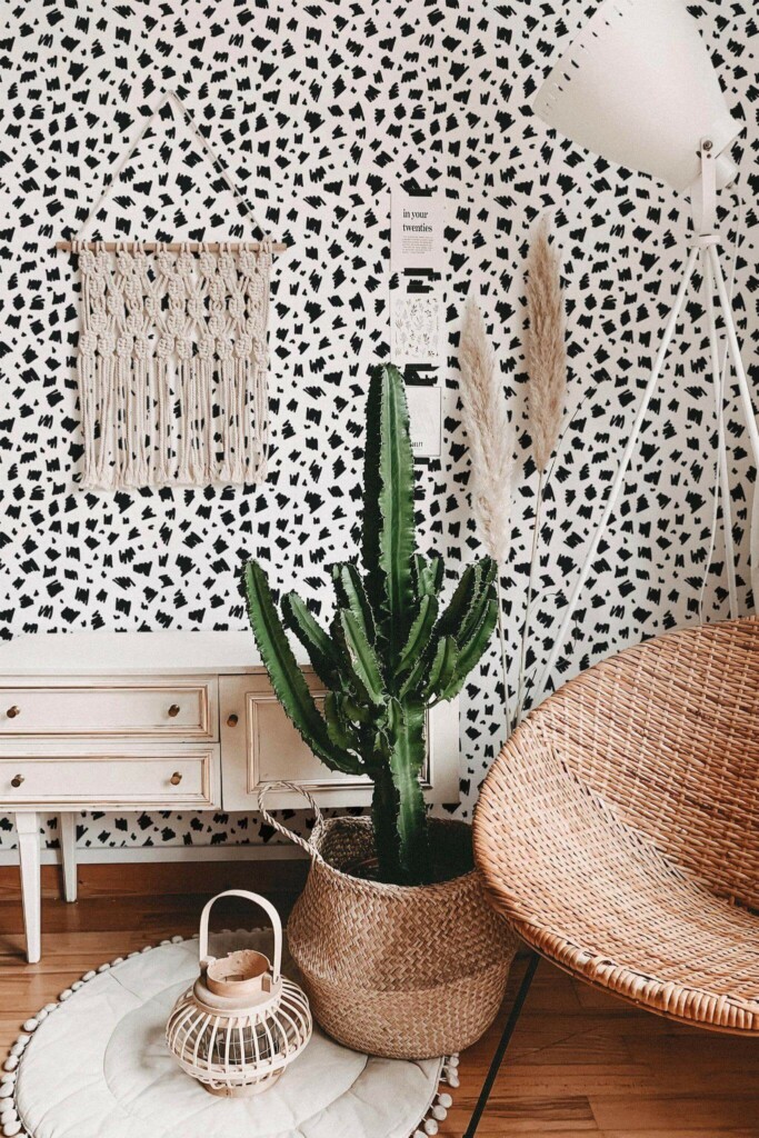 Bohemian style living room decorated with Black hand drawn spots peel and stick wallpaper