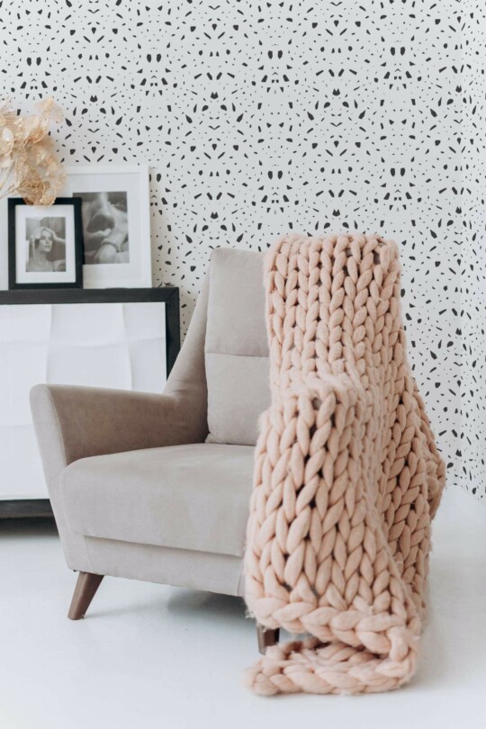 Boho style living room decorated with Black terrazzo peel and stick wallpaper
