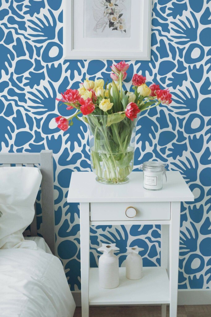 Farmhouse style bedroom decorated with Blue abstract coral peel and stick wallpaper
