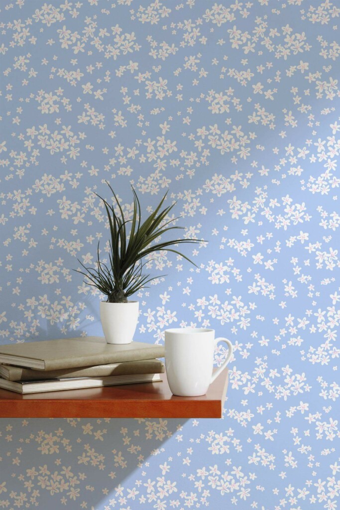 Scandinavian style accent wall decorated with Blue and white daisy peel and stick wallpaper