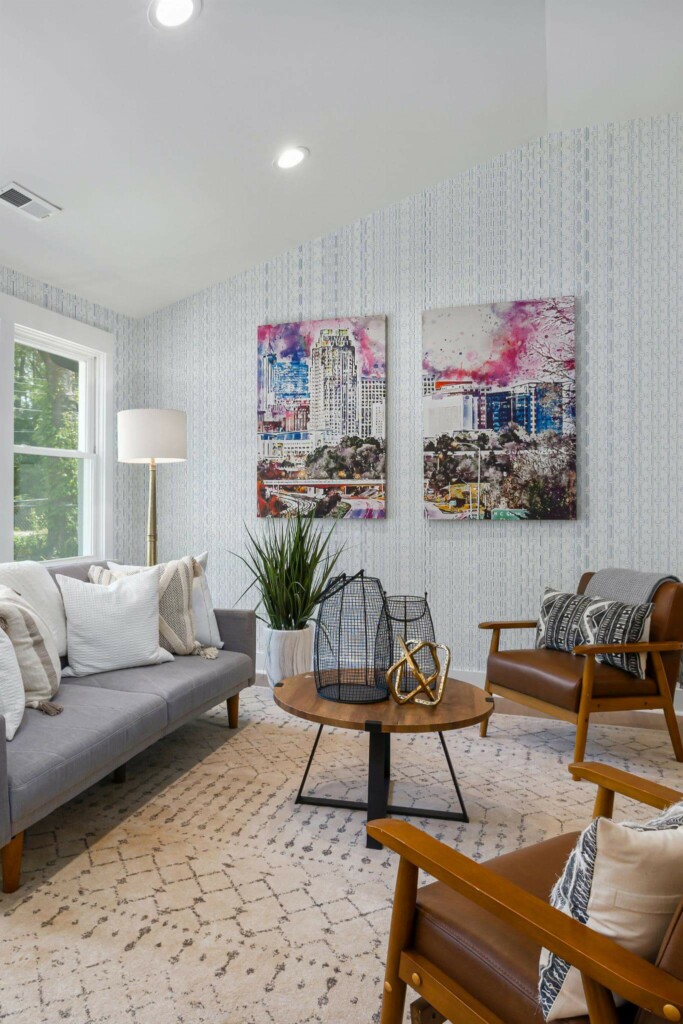 Mid-century modern style living room decorated with Blue and white delicate retro peel and stick wallpaper and colorful funky artwork
