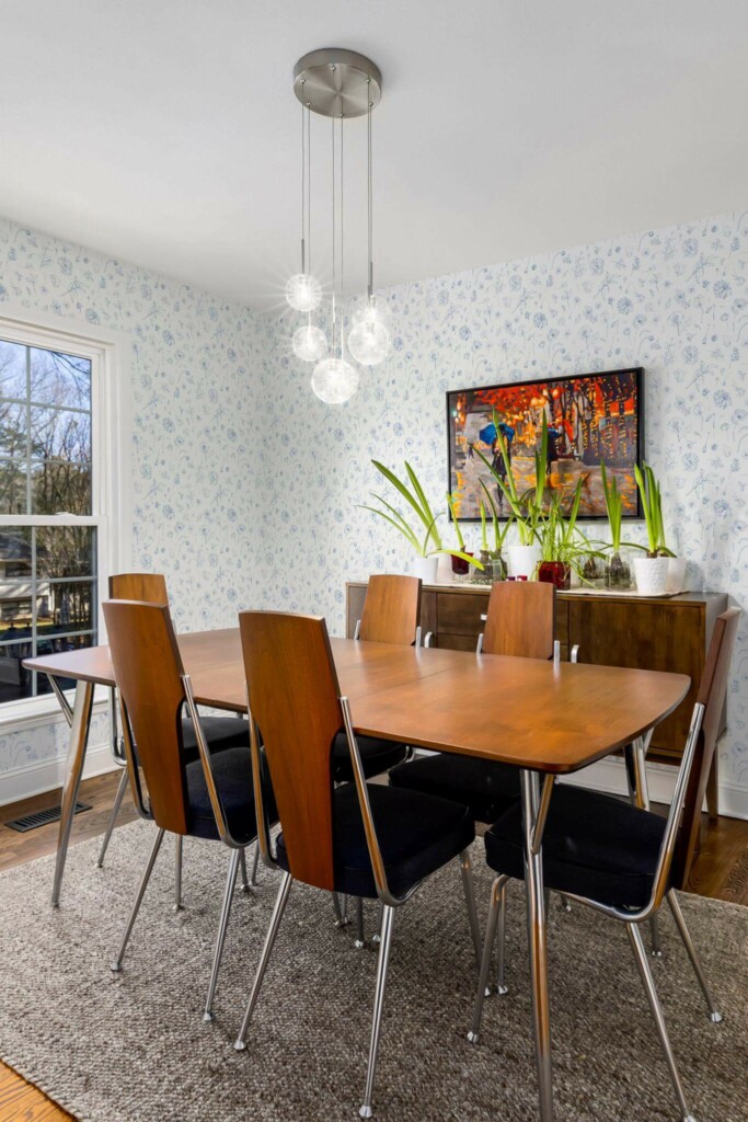 MId-century modern style dining room decorated with Blue and white floral peel and stick wallpaper