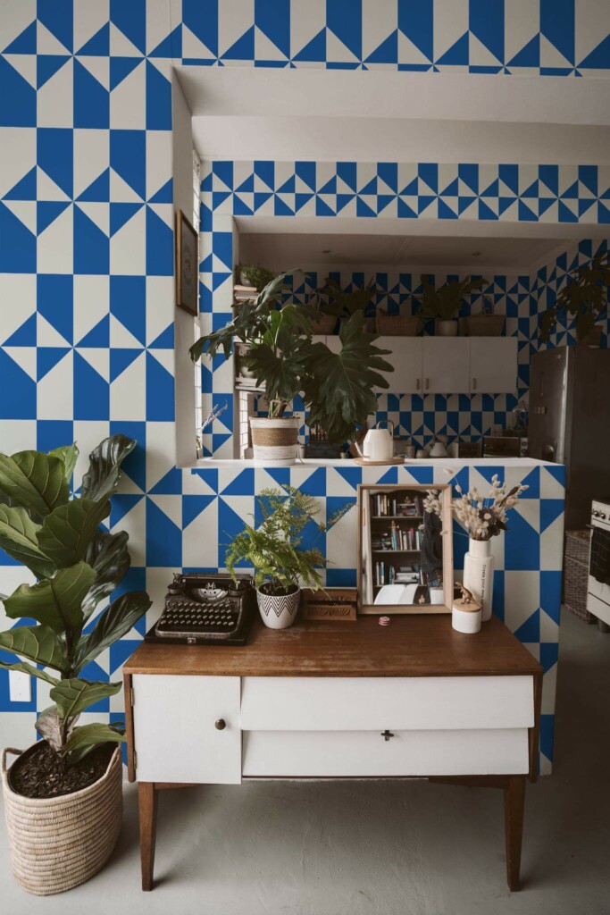Boho style living room and kitchen decorated with Blue and white geometry peel and stick wallpaper and green plants
