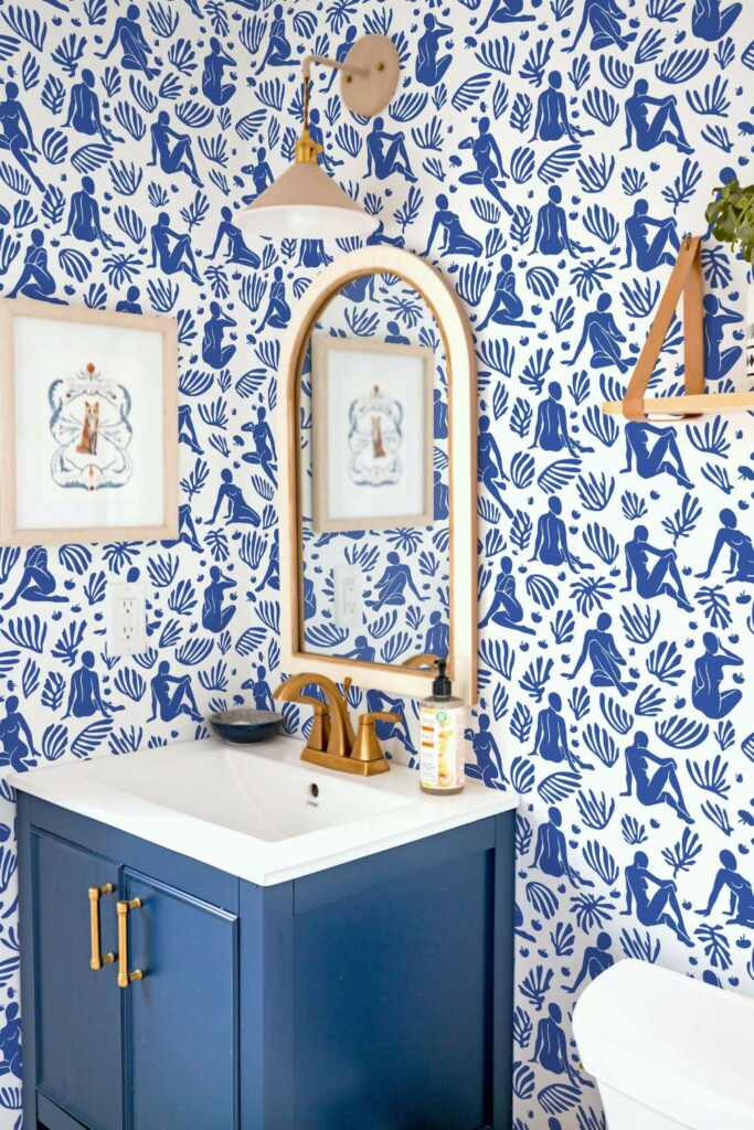 Coastal eclectic style powder room decorated with Blue and white Matisse peel and stick wallpaper