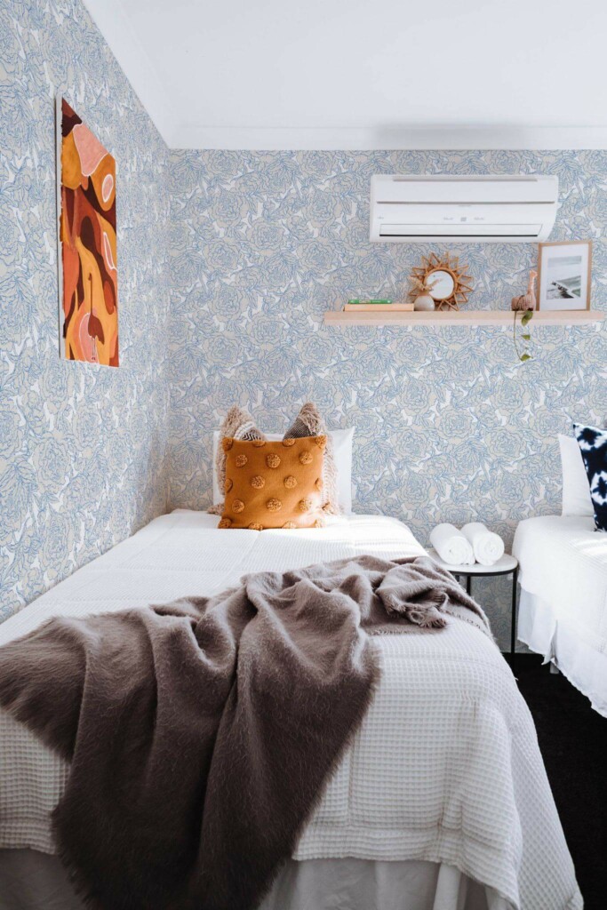 Boho style bedroom decorated with Blue and white peony peel and stick wallpaper