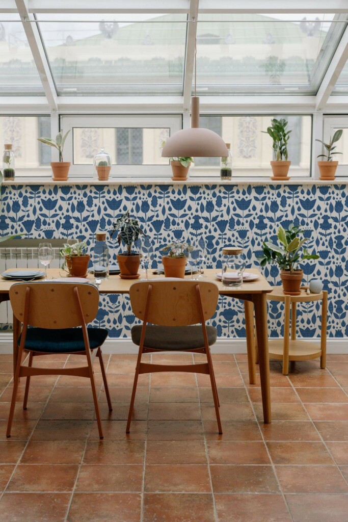MId-century modern style dining room on a balcony decorated with Blue boho floral peel and stick wallpaper
