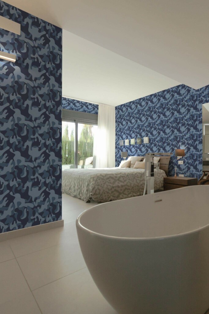 Modern style bedroom with open bathroom decorated with Blue camouflage peel and stick wallpaper