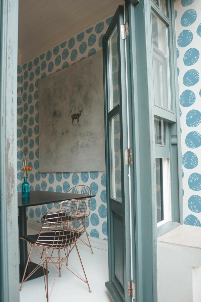 Minimal coastal style cafe decorated with Blue circle peel and stick wallpaper