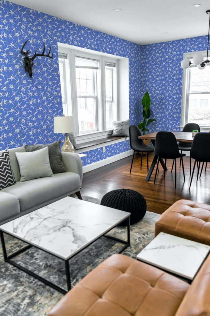 Mid-century modern scandinavian style living dining room decorated with Blue monkey peel and stick wallpaper