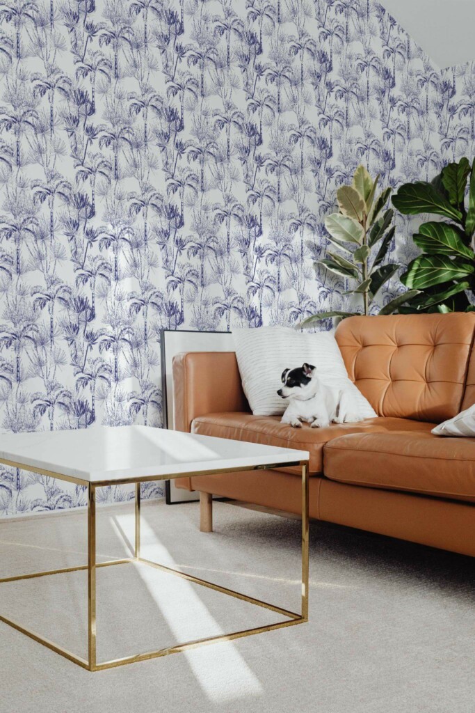 Mid-century modern style living room with dog on a sofa decorated with Blue palm peel and stick wallpaper
