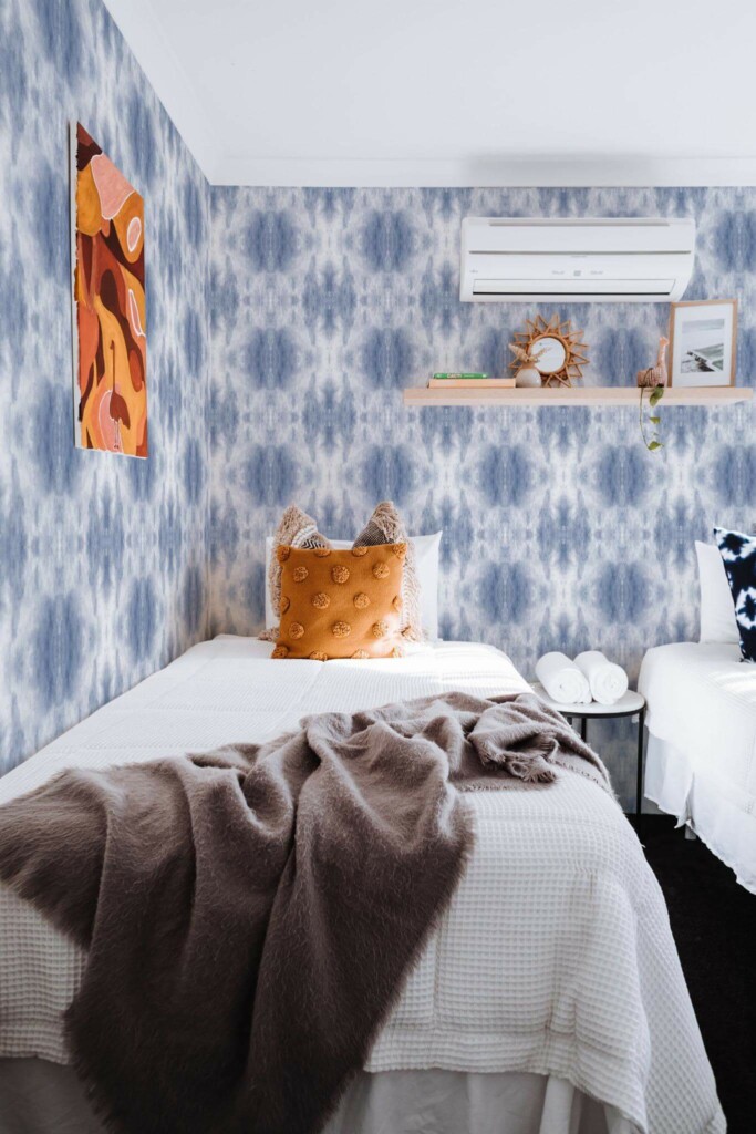 Boho style bedroom decorated with Blue tie dye peel and stick wallpaper