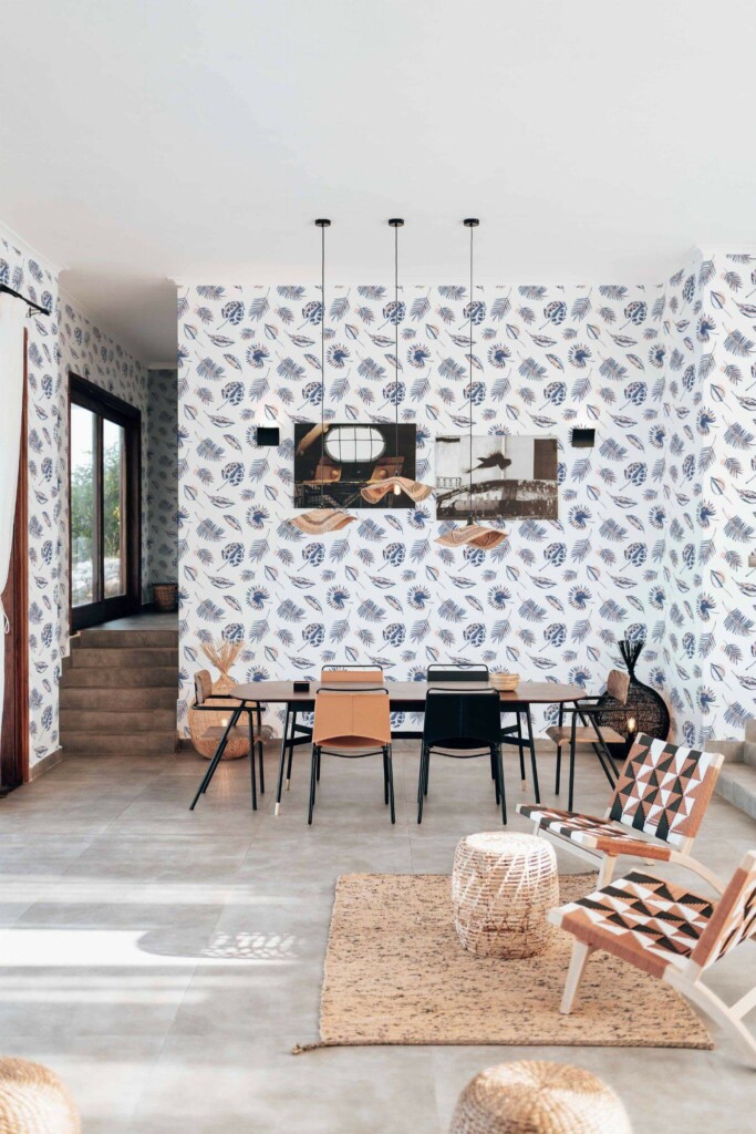 Modern boho style living dining room decorated with Blue tropical leaf peel and stick wallpaper