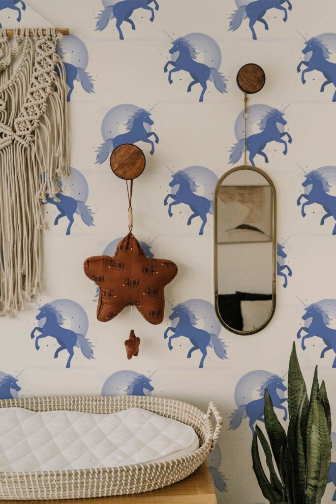 Boho style neutral nursery decorated with Blue unicorn peel and stick wallpaper