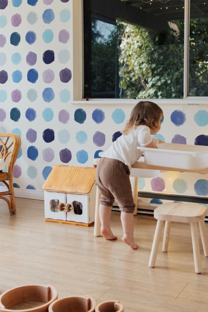 Bohemian style kids room decorated with Blue watercolor dotted peel and stick wallpaper