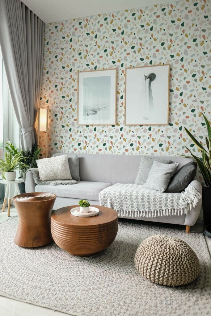 Modern scandinavian style living room decorated with Boho Terrazzo peel and stick wallpaper and green plants